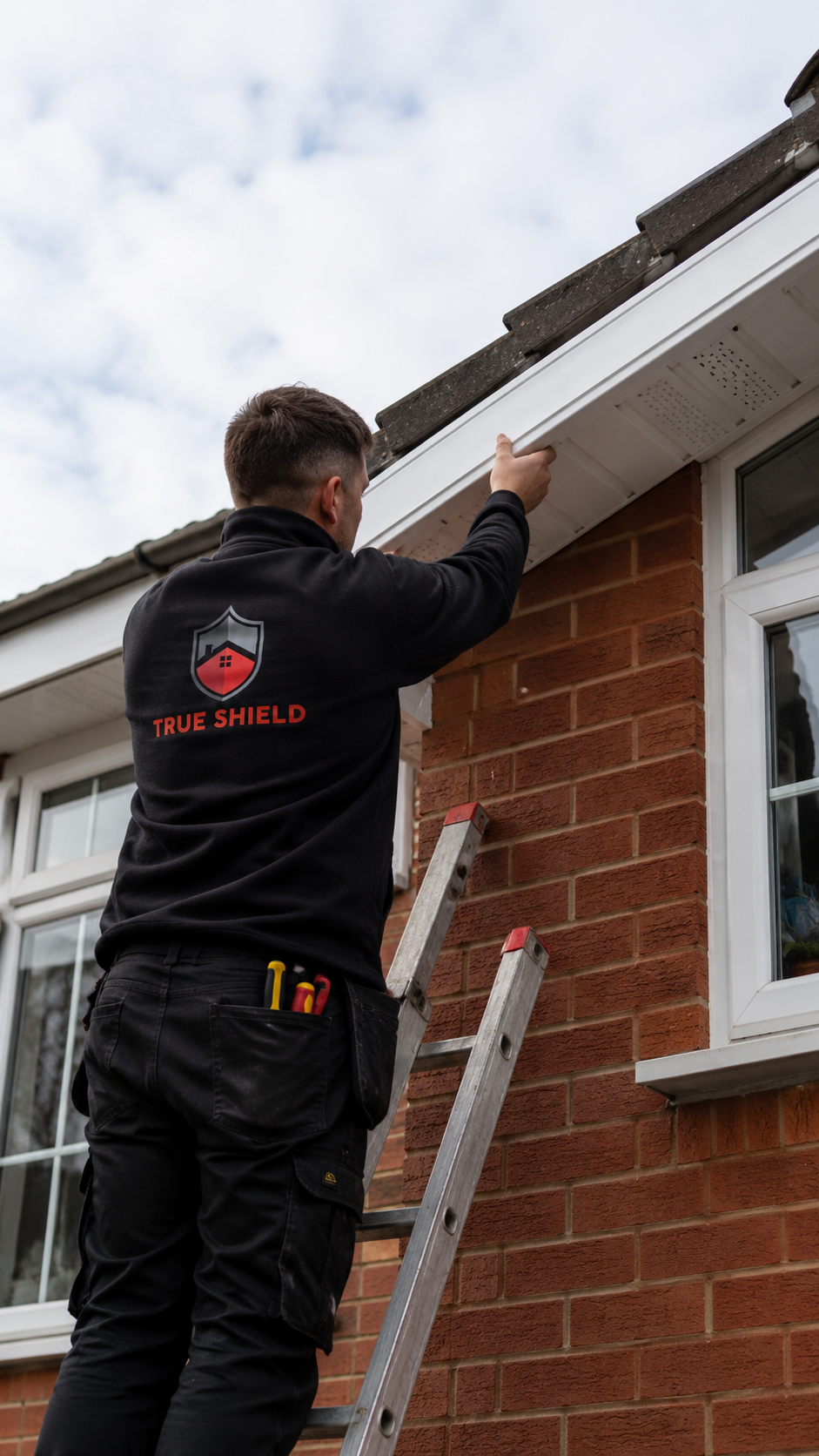 True Shield team fitting new uPVC soffits and fascia boards to a house in Kent